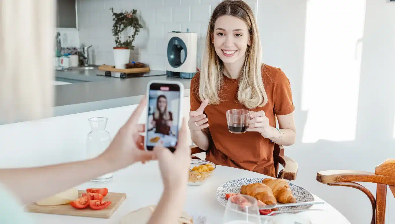 a girl filming cooking video to create social media presence